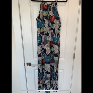 Floral maxi dress with chest teardrop cutout and cinched waist!
